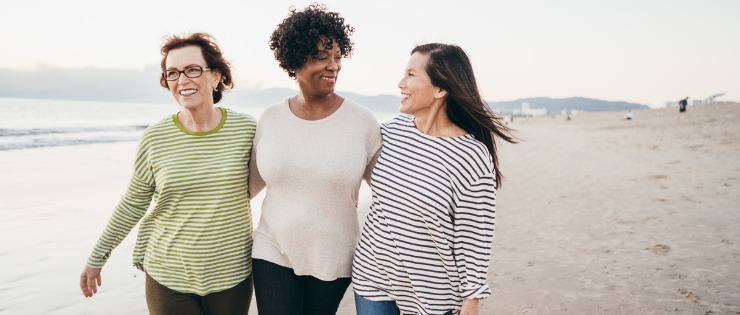 Group of middle aged women smiling after working out, wanting to lose weight at 50