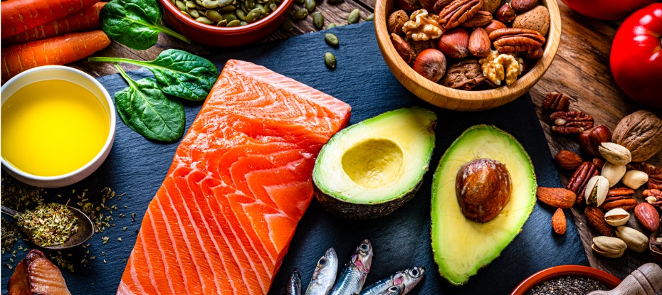examples of foods that are part of a Mediterranean diet, including salmon, avocado, nuts and seeds