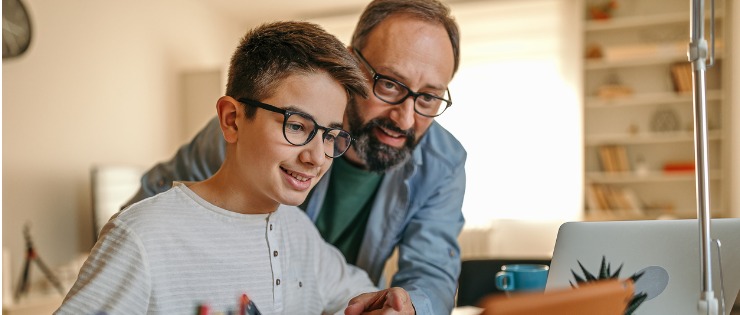 Father and son having a zoom meeting with high-school teacher to discuss son progress