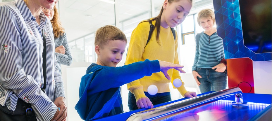 kids exploring and interacting at a science museum