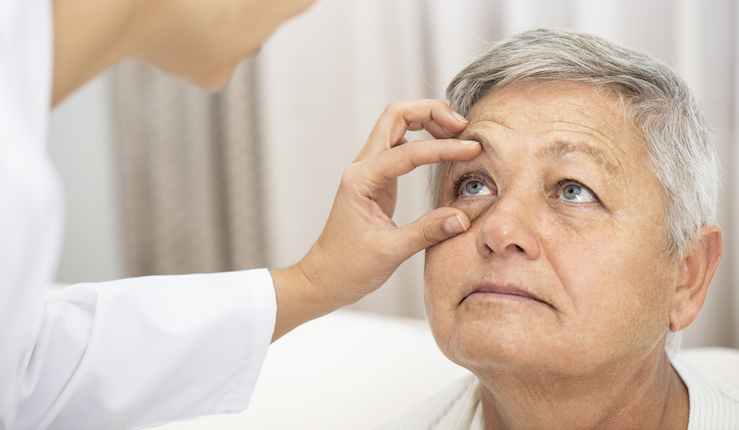 senior lady having her eye health examined by a doctor